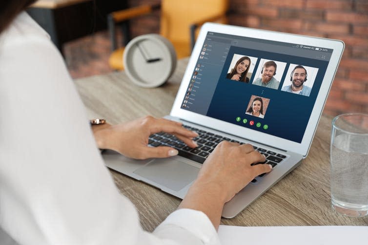 <span class="caption">Video conferencing apps give colleagues a glimpse into your living space. But who else might be watching?</span> <span class="attribution"><a class="link " href="https://www.shutterstock.com/image-photo/woman-having-video-chat-colleagues-table-1390309433" rel="nofollow noopener" target="_blank" data-ylk="slk:New Africa/Shutterstock;elm:context_link;itc:0;sec:content-canvas">New Africa/Shutterstock</a></span>