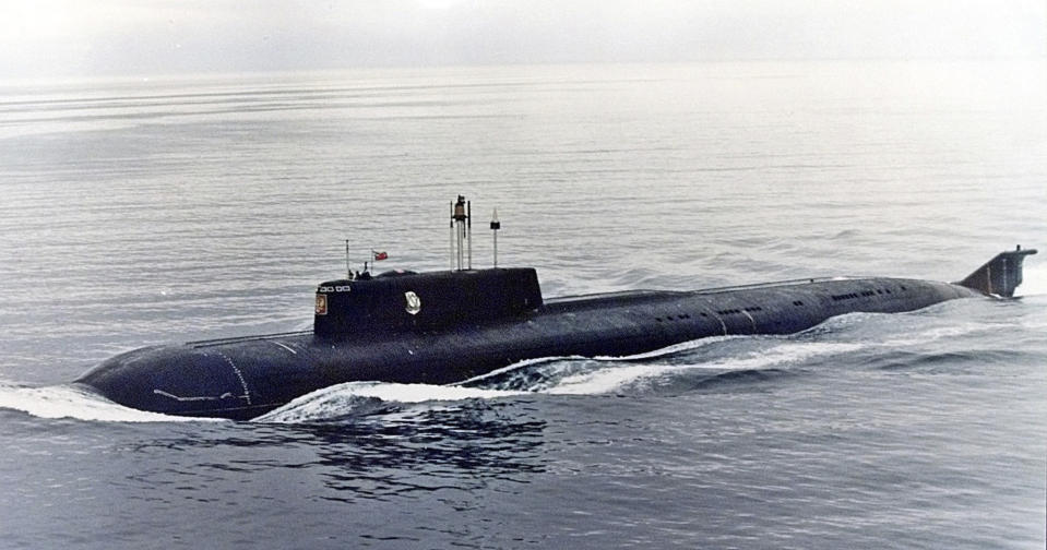 FILE - The Kursk, one of Russia's largest and most advanced submarines, travels in the Barents Sea near Severomorsk, Russia, in this 1999 photo. Adm. Retired Vyacheslav Popov has alleged in an interview released Monday Nov. 22, 2021, that the 2000 Kursk submarine disaster was caused by a collision with a NATO sub, an unproven claim that defies the official conclusion that the country's worst post-Soviet naval catastrophe was triggered by a faulty torpedo. (AP Photo/File)