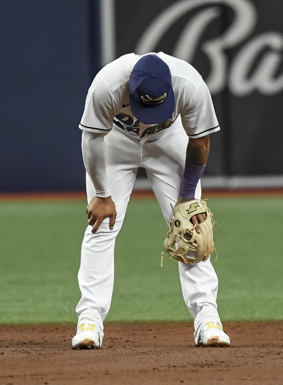 Tampa Bay Rays shortstop Wander Franco reacts after making a fielding error during the third inning of a baseball game against the Los Angeles Angels, Saturday, June 26, 2021, in St. Petersburg, Fla. (AP Photo/Steve Nesius)