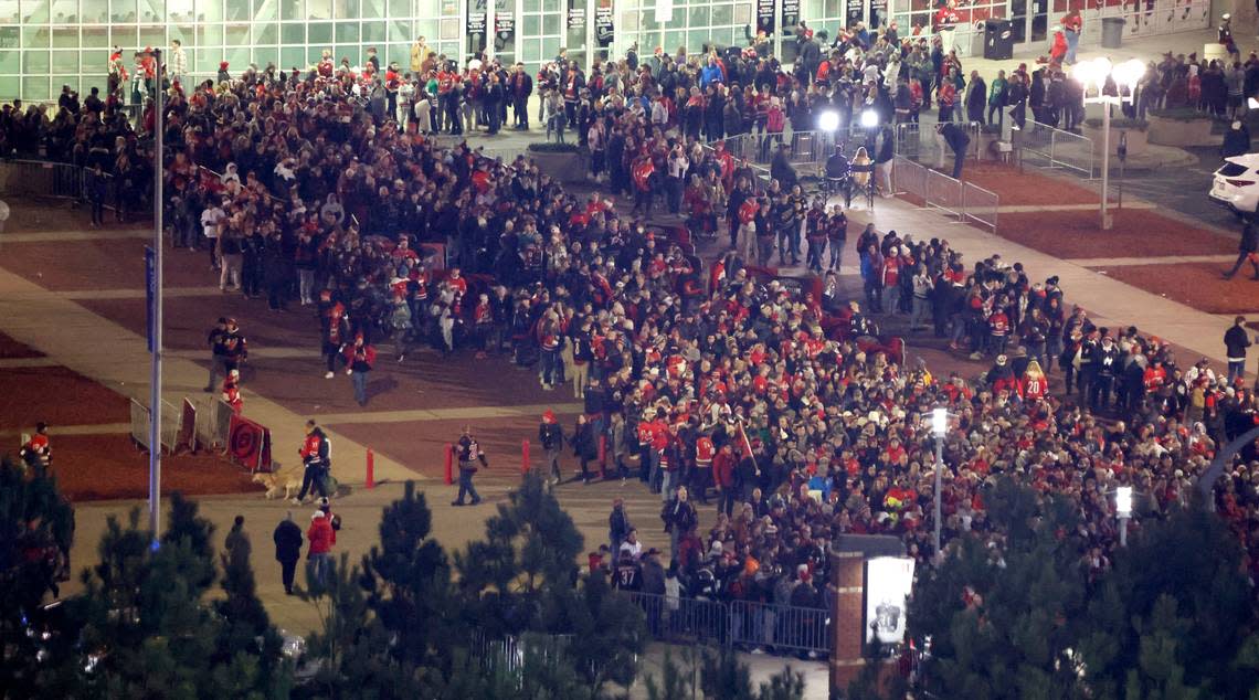 At 7:11 pm, the line to enter the stadium goes all the way to PNC Arena before the NHL Stadium Series game between the Carolina Hurricanes and the Washington Capitals at Carter-Finley Stadium in Raleigh, N.C., Saturday, Feb. 18, 2023.