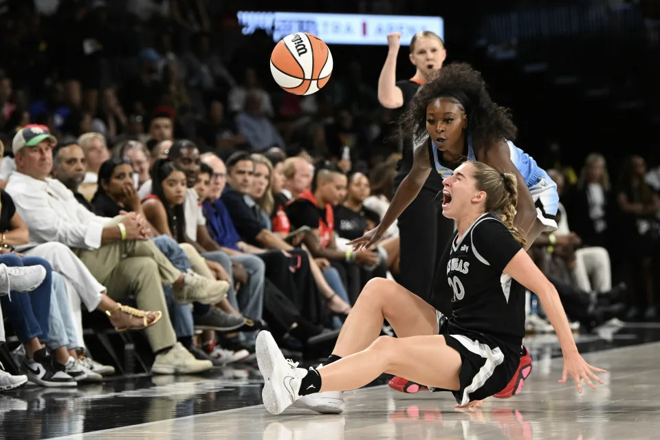 LAS VEGAS, NEVADA - JULY 16: Kate Martin #20 of the Las Vegas Aces goes down with an injury against the Chicago Sky in the first half at Michelob ULTRA Arena on July 16, 2024 in Las Vegas, Nevada. (Photo by Candice Ward/Getty Images)