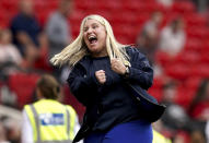 Chelsea manager Emma Hayes celebrates after Mayra Ramirez scores their side's fourth goal of the game, during the English Women's Super League soccer match between Manchester United and Chelsea at Old Trafford, in Manchester, England, Saturday May 18, 2024. (Martin Rickett/PA via AP)