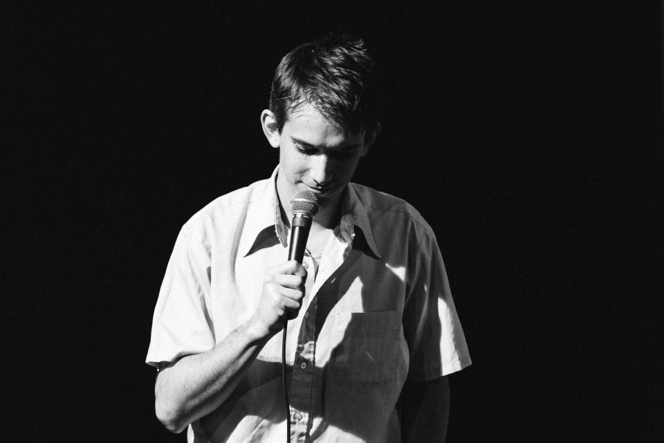 Andrew Dismukes performs during the 2023 Moontower Just for Laughs comedy festival. Dismukes went to the University of Texas and cut his teeth in the Austin scene.