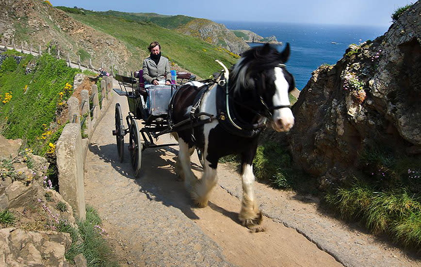 Sark, Channel Islands: Tradition's last stand In Sark, time flows like molasses. Sarkees will mark the 450th anniversary of feudalism in 2015; the tiny Channel Island off the coast of Normandy abolished the medieval form of governance in 2008. But old ways linger: The two banks have no ATMs; the unpaved roads lack street lights; cars are banned. — Peter Johansen