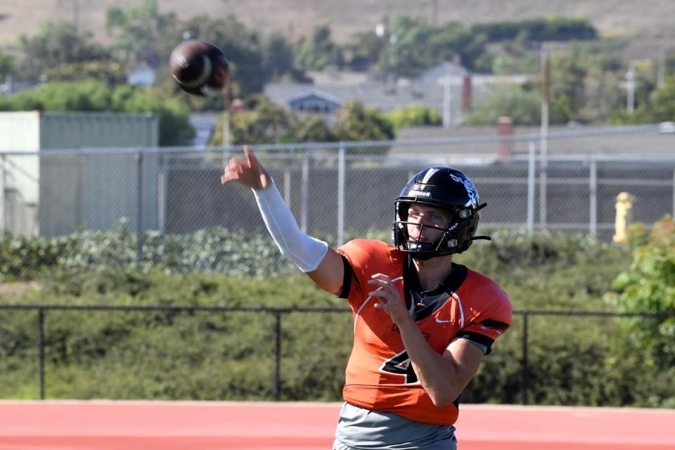 Quarterback Chris Irvin throws a pass during a Ventura College football practice on Tuesday, Aug. 30, 2023. The Pirates open their season Saturday at Saddleback.