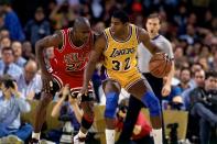 Five-time NBA champion Magic Johnson faced off against Michael Jordan in a dream NBA Finals in 1991. In a symbolic changing of the guard, the Bulls beat the Lakers, 4-1, for Jordan's first NBA ring. (Getty Images)