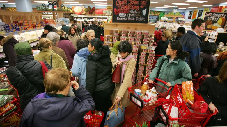 People in a crowded grocery store