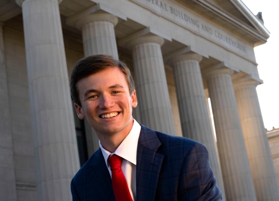 Tuscaloosa Academy student Brilyn Hollyhand, 17, is a political commentator, strategist and founder of Truth Gazette, a publication he started when he was 11. Hollyhand will be on hand to cover the Republican debate Dec. 6 in Tuscaloosa. Hollyhand is photographed in front of the Richard Shelby Federal Building in Tuscaloosa.