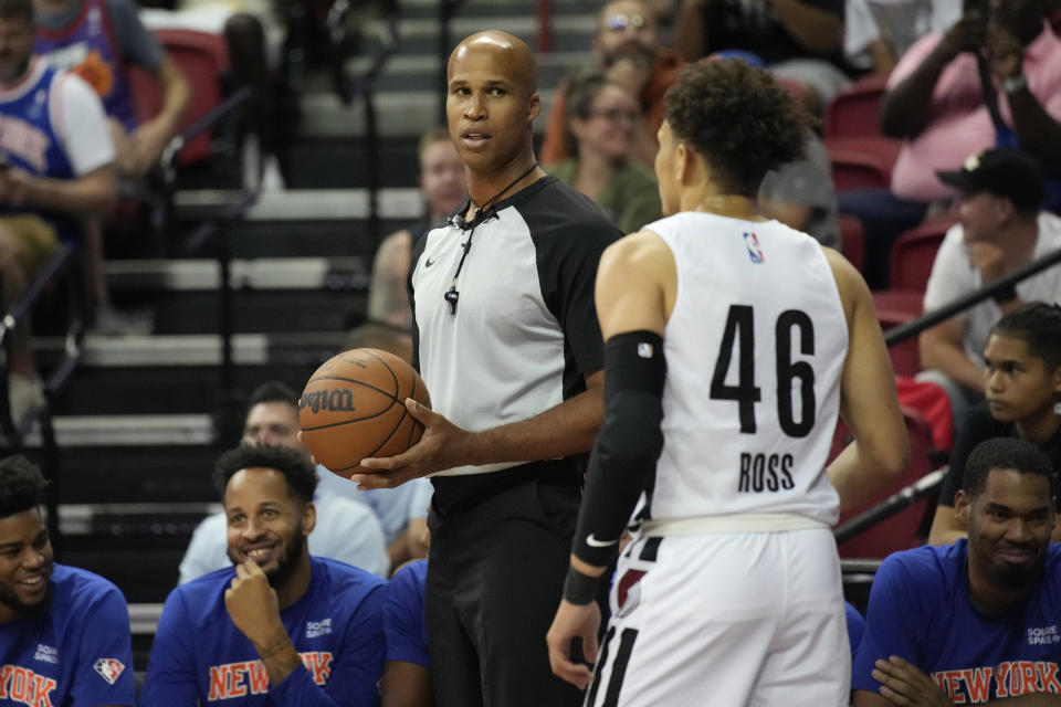 Former NBA player Richard Jefferson, left, officiates part of an NBA summer league basketball game between the Portland Trail Blazers and the New York Knicks, Monday, July 11, 2022, in Las Vegas. (AP Photo/John Locher)