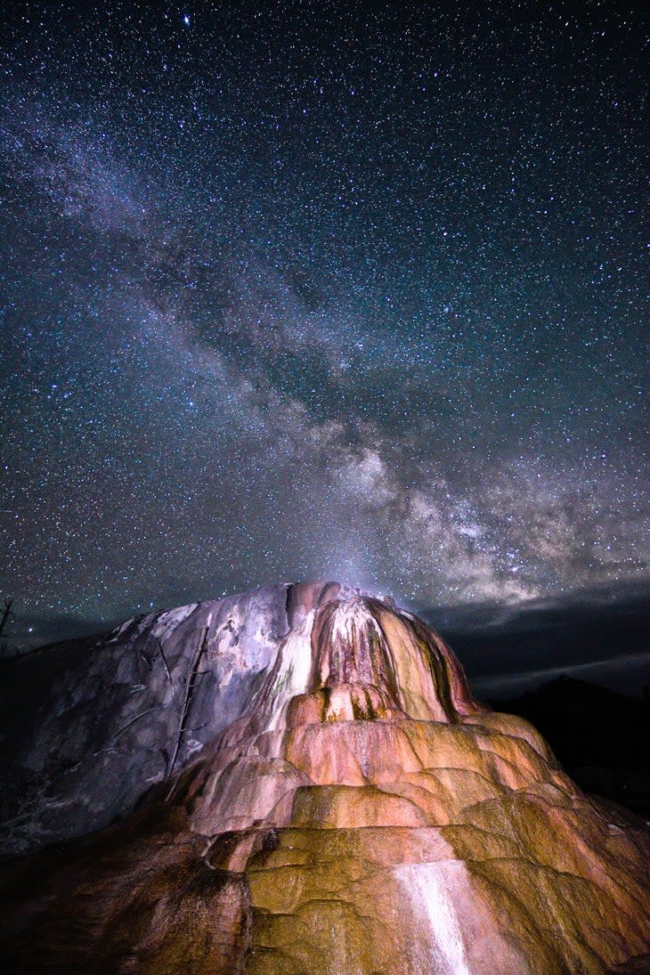 Orange Mound Spring and the Milky Way at Mammoth Upper Terraces Drive in Yellowstone National Park