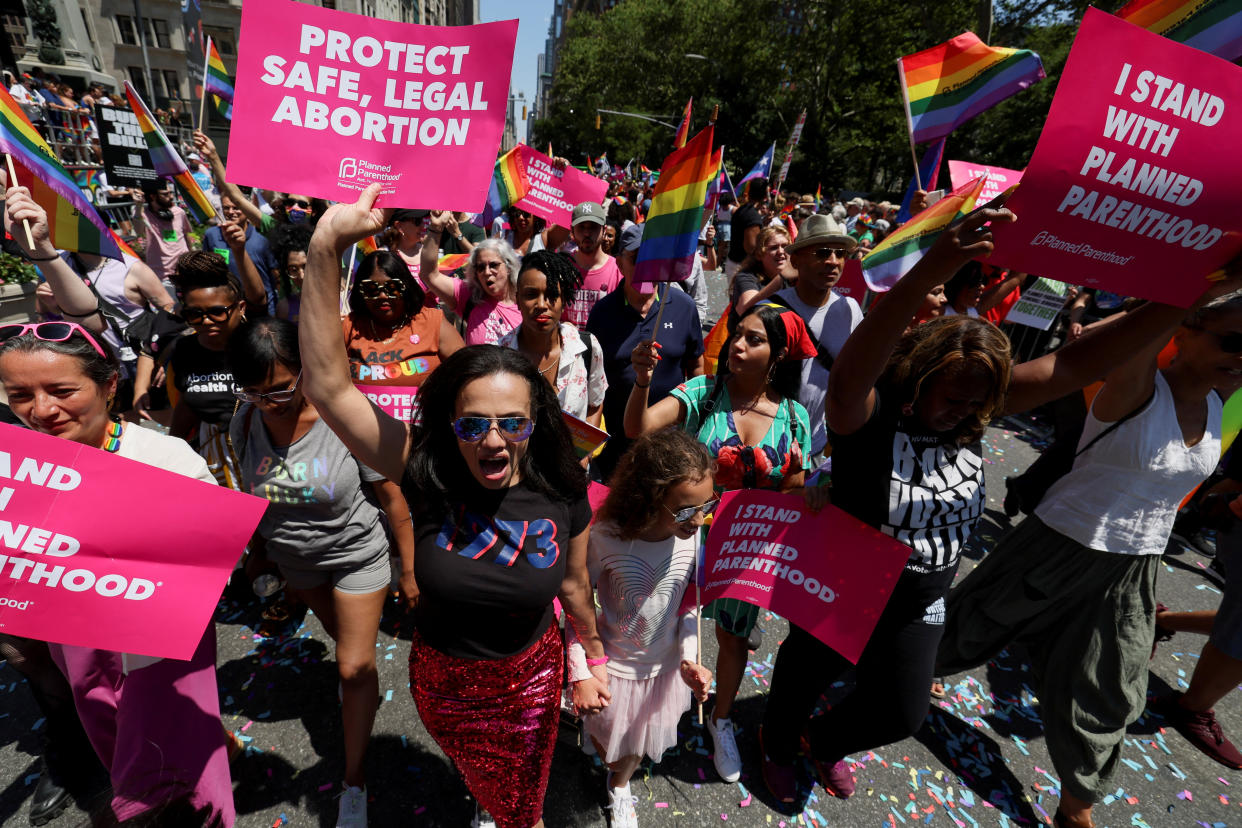 Members of Planned Parenthood invited to lead the 2022 NYC Pride parade march in response to the overturn of the landmark Roe v Wade abortion decision, in New York City, New York , U.S., June 26, 2022. REUTERS/Brendan McDermid