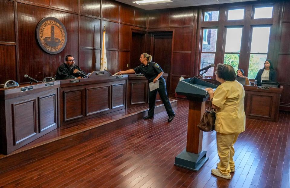 Central Falls Municipal Court Judge Joseph Molina Flynn will sometimes continue a case to give a person who doesn't speak English a chance to find an interpreter. If they can't, the city will hire a professional interpreter from the state courts.