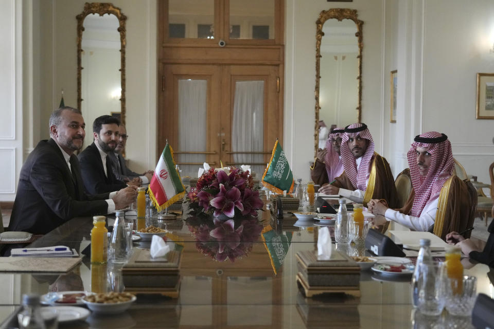 Saudi Arabia's Foreign Minister Prince Faisal bin Farhan, right, attends a meeting with his Iranian counterpart Hossein Amirabdollahian, left, in Tehran, Iran, Saturday, June 17, 2023. Saudi Arabia’s top diplomat has arrived in the Iranian capital,Tehran, the latest step in the restoration of diplomatic ties between the two Mideast rivals, Iranian state media reported. (AP Photo/Vahid Salemi)