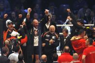 Boxing - Wladimir Klitschko v Tyson Fury WBA, IBF & WBO Heavyweight Title's - Esprit Arena, Dusseldorf, Germany - 28/11/15 Tyson Fury celebrates after being declared the winner of the fight as Wladimir Klitschko looks dejected Reuters / Ina Fassbender Livepic