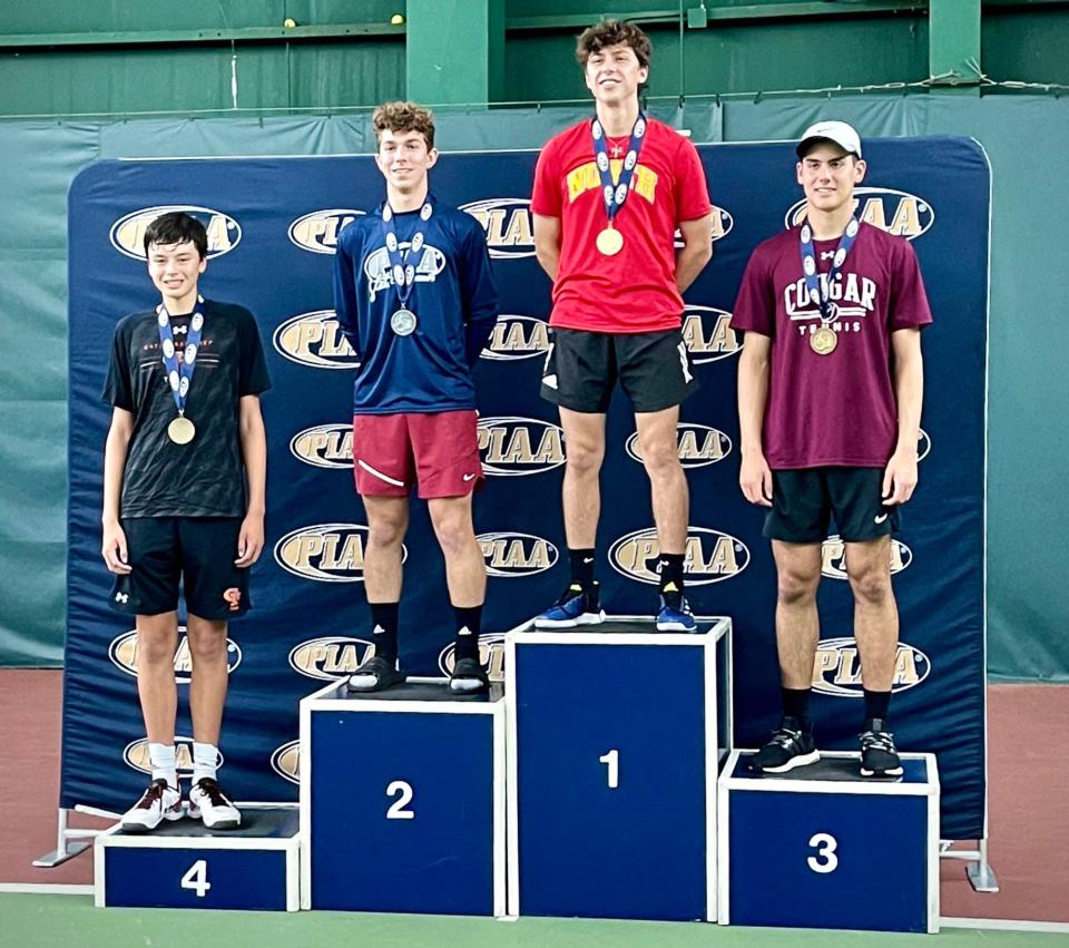 Cathedral Prep freshman Jonah Ng, left, wears his fourth-place medal on Saturday, May 28, 2022, at the PIAA Class 2A singles tennis tournament. 