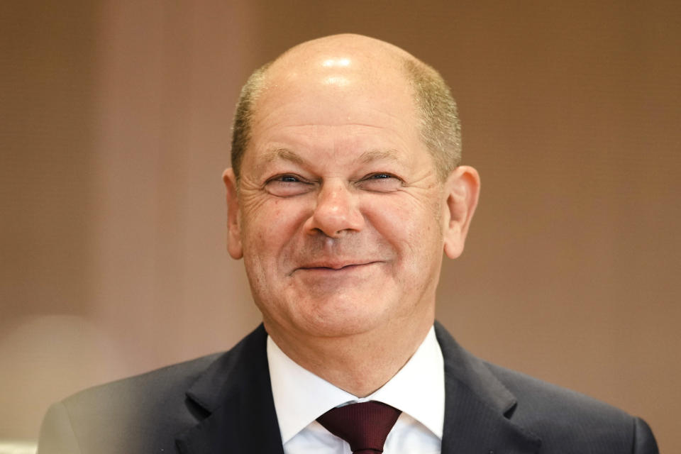 German Chancellor Olaf Scholz arrives for a weekly cabinet meeting at the chancellery in Berlin, Germany, Wednesday, Oct. 26, 2022. (AP Photo/Markus Schreiber)