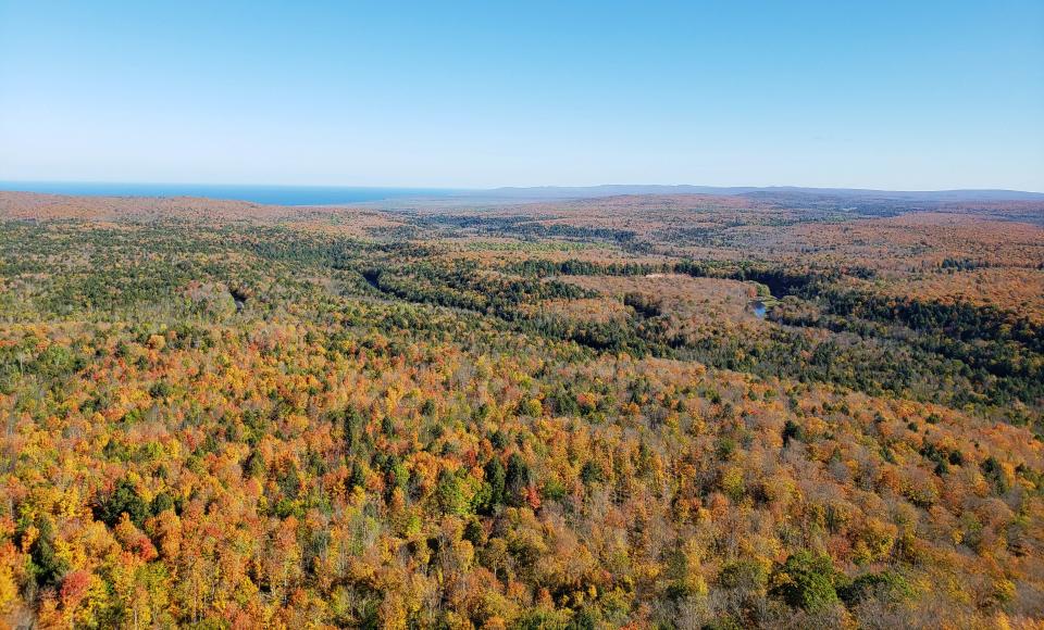 Copper Peak ski jump offers views of fall colors surrounding the Black River as it winds its way to Lake Superior in Ironwood, Mich., October 7, 2021.