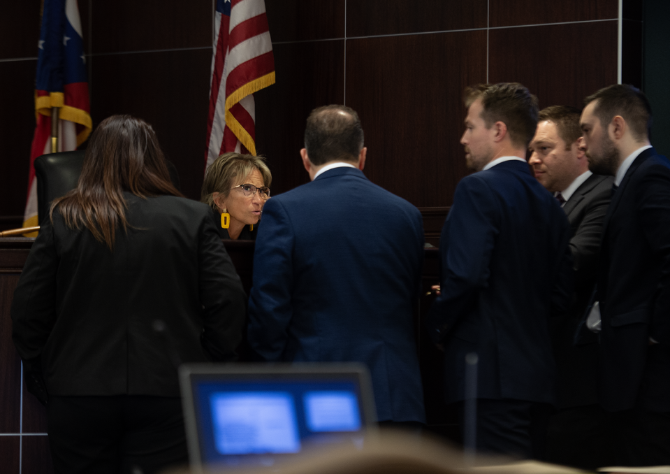 Judge Becky Doherty talks with attorneys during the closing arguments in the trial for Donald Small, of Suffield, for the stabbing death of his wife, Barbara Small, in Feb. 2022.