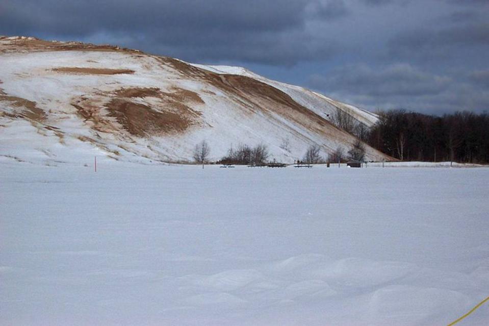 A winter view of an area popular for dune climbing is seen at Sleeping Bear Dunes National Lakeshore.