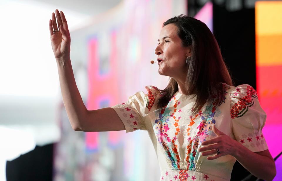 Lydia Fenet takes bids on a lot during the 2023 Naples Winter Wine Fest at The Ritz-Carlton Golf Resort in Naples on Saturday, Feb. 4, 2023.