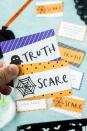 <p>A twist on Truth or Dare, Truth or Scare tasks players with Halloween-themed questions and physical challenges. You can even head to the Play Party Plan website for lists of family-friendly "truth" questions.</p><p><em><a href="https://www.playpartyplan.com/easy-halloween-party-games/" rel="nofollow noopener" target="_blank" data-ylk="slk:Get the tutorial at Play Party Plan »;elm:context_link;itc:0;sec:content-canvas" class="link ">Get the tutorial at Play Party Plan »</a></em></p>