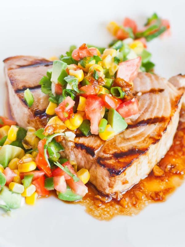 <p>Tatyana's Everyday Food</p><p>If you love seafood, you’re going to love this delicious swordfish recipe. It’s made with a ginger garlic sauce and served with the best avocado mango salsa! You can prepare this recipe on the grill or in a pan–both ways are delicious!</p><p><strong>Get the recipe: <a href="https://tatyanaseverydayfood.com/recipe-items/grilled-garlic-swordfish/" rel="nofollow noopener" target="_blank" data-ylk="slk:Grilled Garlic Swordfish;elm:context_link;itc:0;sec:content-canvas" class="link rapid-noclick-resp">Grilled Garlic Swordfish</a></strong></p>