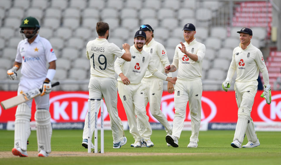 Catcher Ben Stokes celebrates with teammates at England v Pakistan: Day 3