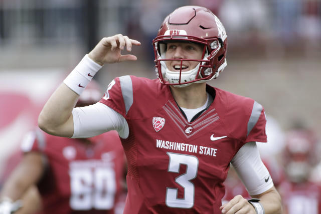 FILE - In this Sept. 17, 2016, file photo, Washington State quarterback Tyler Hilinski (3) runs onto the field with his teammates before an NCAA college football game against Idaho, in Pullman, Wash. Mark and Kym Hilinski keenly remember the swirl of activity. Rushing to Pullman after learning their son, Tyler, had taken his life. Planning memorial services both on the Washington State campus and back home in Southern California. Dealing with authorities as they tried to determine why 21-year-old Tyler was gone. The Hilinskis could have been overwhelmed by the grief and sadness. Then the letters and boxes began arriving at their home, sent by Cougars players, fans and others, saying how much they had been touched by Tyler&#39;s story. (AP Photo/Young Kwak, File)