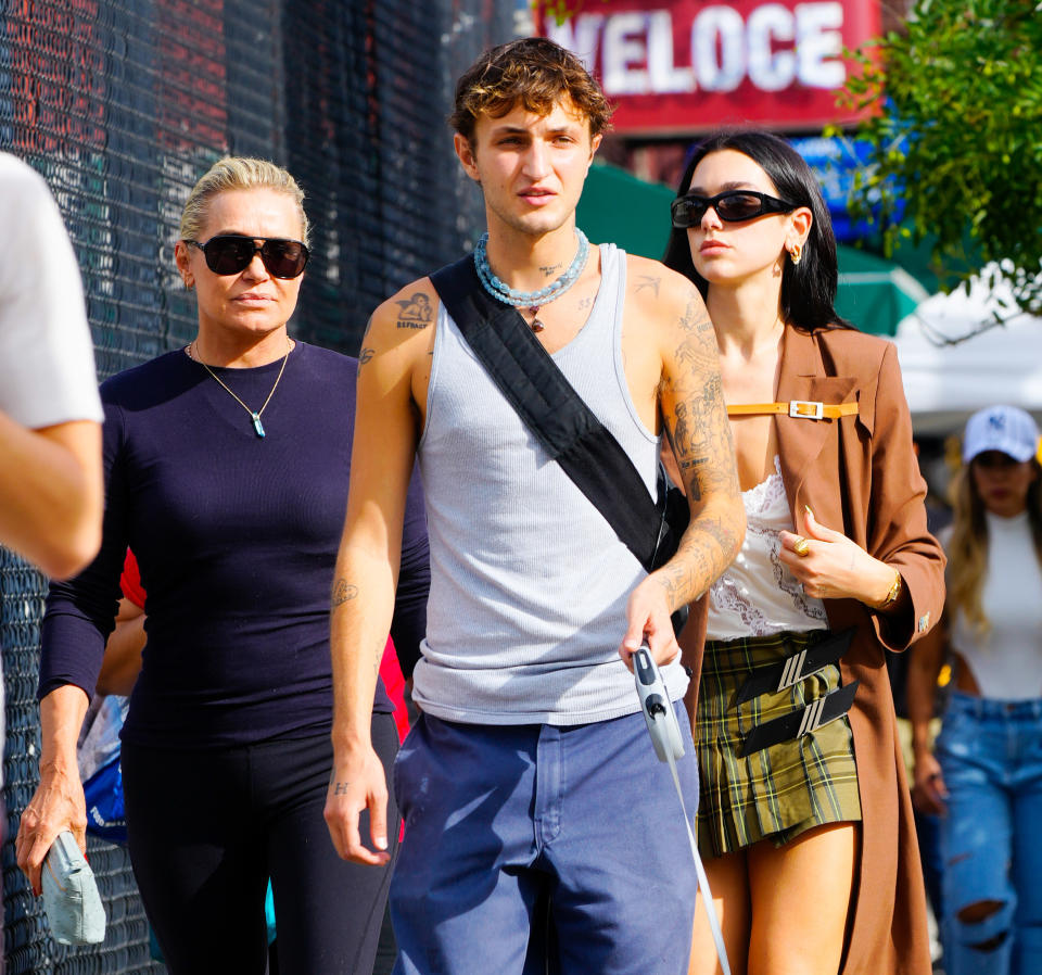 Anwar Hadid walking down the street