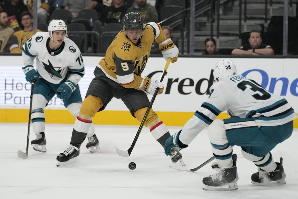 Vegas Golden Knights center Jack Eichel (9) skates around San Jose Sharks defenseman Mario Ferraro (38) during the second period of an NHL hockey game Friday, Nov. 10, 2023, in Las Vegas. (AP Photo/John Locher)