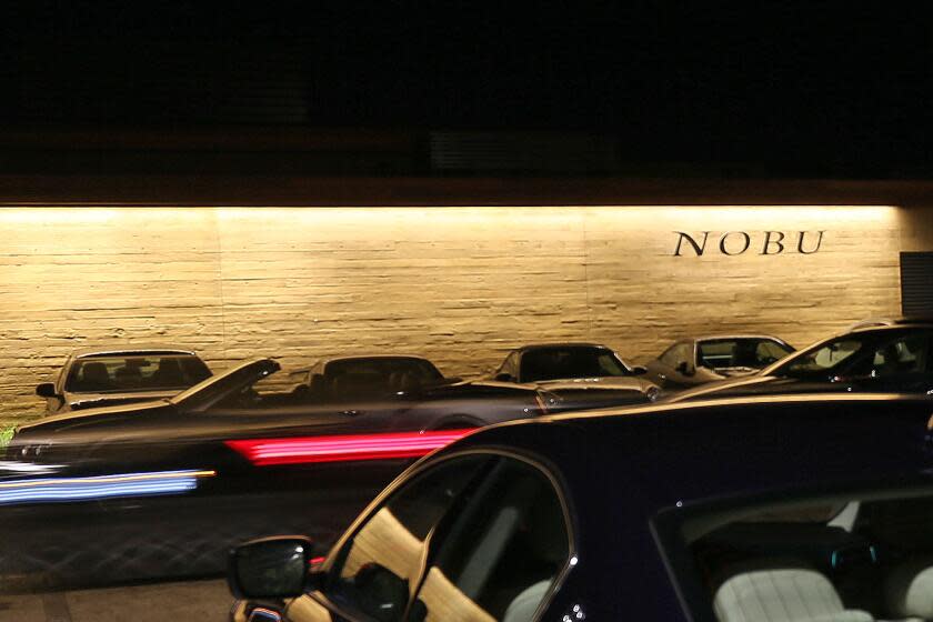 An exterior view of Nobu on Pacific Coast Highway in Malibu at night.