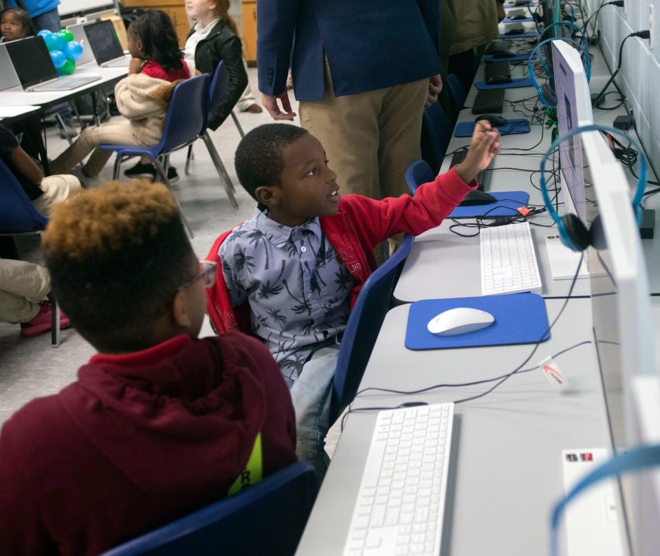 Children at the Boys and Girls Clubs of the Emerald Coast learn about 3D printing at the new Cox Technology Innovation Lab at the Pensacola Club in Englewood on Wednesday, Dec. 30, 2022. The $20,000 collaborative workspace features new computer workstations, enhanced digital learning, S.T.E.A.M. focus areas and two 3D printers.