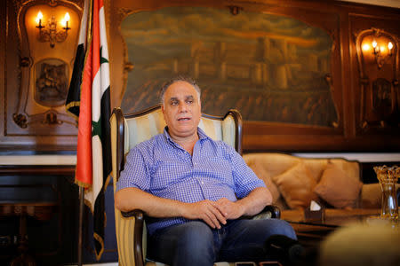 Talal Barazi, governor of Homs talks during an interview with Reuters in Homs, Syria July 29, 2017. Picture taken July 29, 2017. REUTERS/Omar Sanadiki