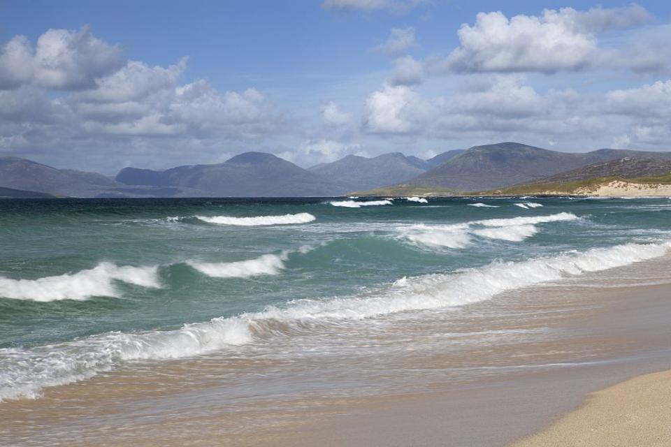 <p>Scarista Beach looks like a landscape straight out of an old oil painting. An image of softness and salt air, it's remote but worth it. There are also plenty of quirky cafes nearby, perfect for making a day of getting your hair windswept and your cheeky rosy against the weather. Plus, you might just be able to spot some porpoises!</p><p><a class="link " href="https://www.booking.com/index.en-gb.html?label=gen173nr-1BCAEoggI46AdIM1gEaFCIAQGYAQm4ARfIAQzYAQHoAQGIAgGoAgO4AuSntJ8GwAIB0gIkZTZiYWM5ODgtZTI5Yi00NDcwLTk2ZTUtYmE1OTEzZDQ5YTRk2AIF4AIB&keep_landing=1&sb_price_type=total" rel="nofollow noopener" target="_blank" data-ylk="slk:FIND ACCOMODATION;elm:context_link;itc:0;sec:content-canvas">FIND ACCOMODATION</a></p>