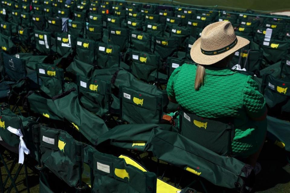 A fan grabs a seat at the 18th green for Sunday's final round.