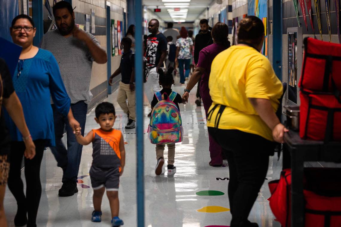 Students arrive to campus on the first day of school Monday, Aug. 15, 2022, at Clifford Davis Elementary School in Fort Worth.
