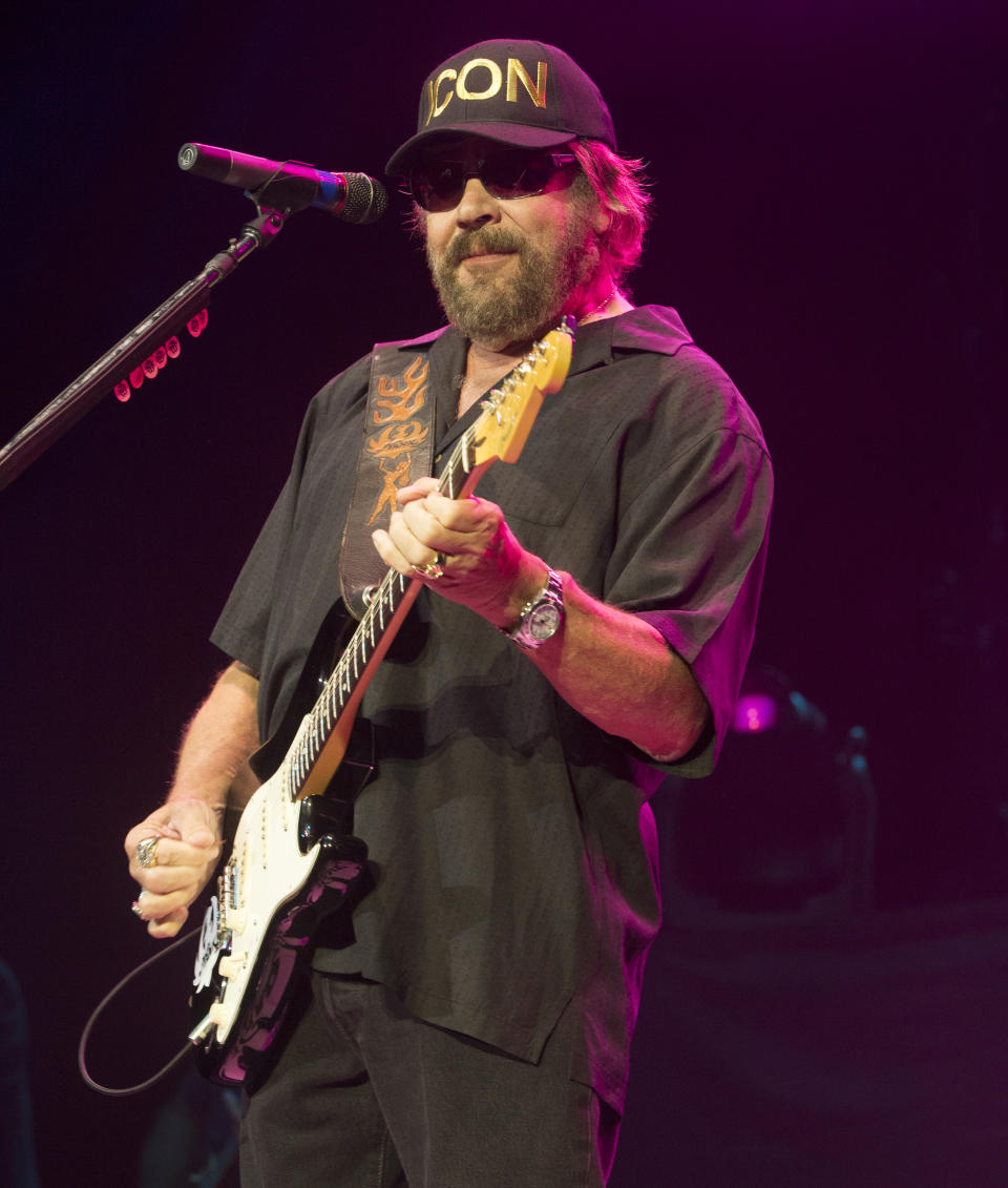 FILE - Hank Williams, Jr. performs at The BB&T Pavilion in Camden, N.J., on Aug. 19, 2017. Williams Jr. is unleashing his alter ego Thunderhead Hawkins on a new record of raunchy blues songs. “Rich White Honky Blues” shows the Country Music Hall of Famer's early influences from blues that later helped him develop his blue-collar Southern country rock sound. (Photo by Owen Sweeney/Invision/AP, File)