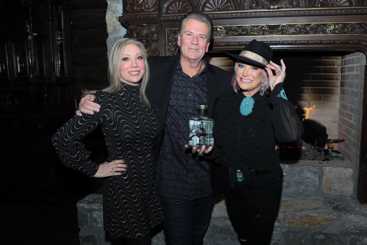 From left, Bill and Shannon Miller of Icon Entertainment & Hospitality pose with Tanya Tucker.