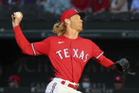 Texas Rangers starting pitcher Mike Foltynewicz throws during the first inning against the Seattle Mariners in a baseball game Friday, May 7, 2021, in Arlington, Texas. (AP Photo/Richard W. Rodriguez)