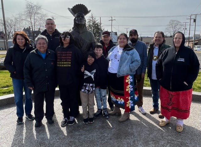 Lenape tribe members recently visited Newcomerstown to see a Chief Netawatwees statue that has been erected outside the Temperance Tavern Museum. Pictured are Denise Stonefish, Roger Thomas, Debra Dobson, Brad Kilscrow, Jeremy Johnson, Mathew Putnam, Michelle Fisher Kennedy, Trinity Guido, Andrea Jacobs, Larry Johnson, Debra Scherer, and Philip Doxtator.