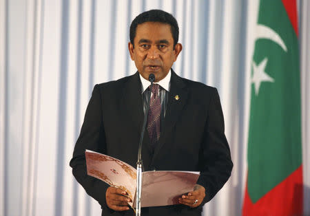 FILE PHOTO: Abdulla Yameen takes his oath as the President of Maldives during a swearing-in ceremony at the parliament in Male November 17, 2013. REUTERS/Waheed Mohamed