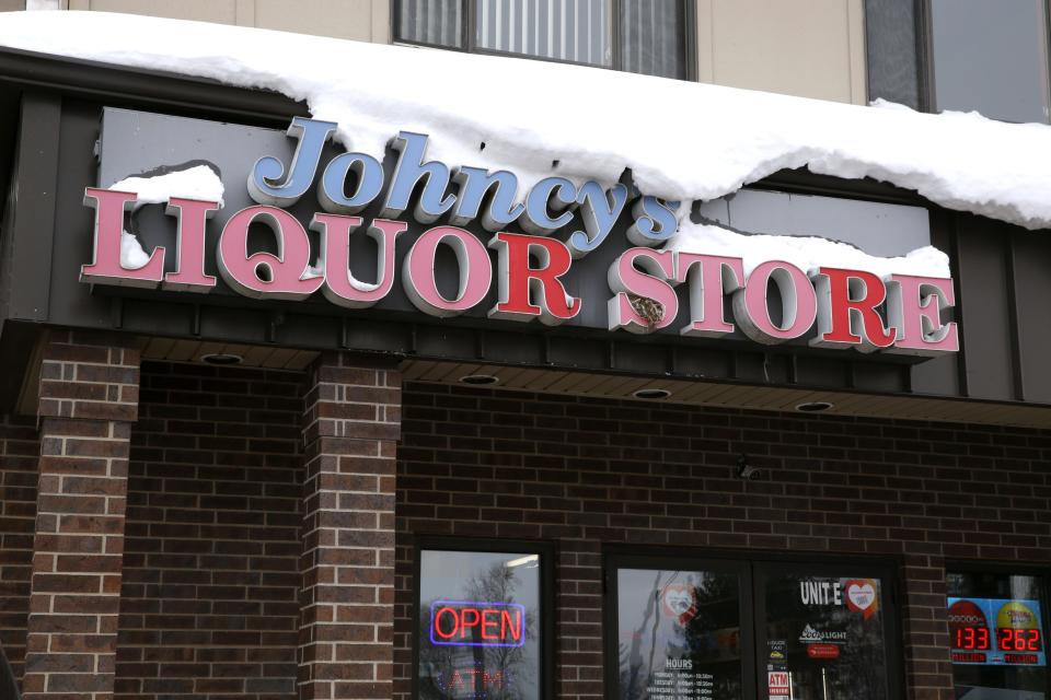 Johncy's Liquor Store sign is pictured Monday, Jan. 22, 2024 in North Liberty, Iowa.