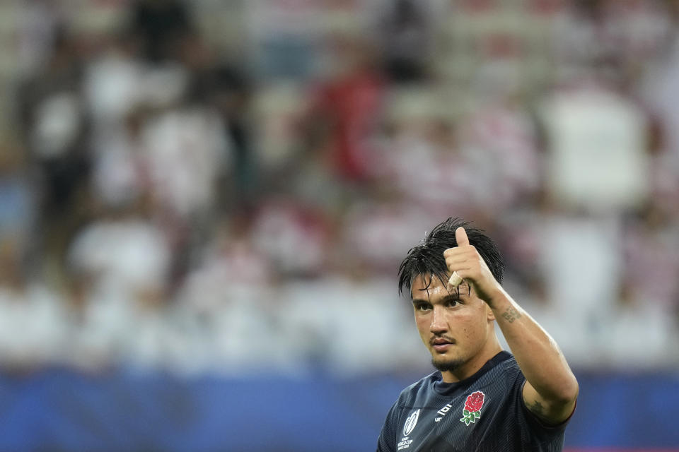 England's Marcus Smith gestures to the fans after the end of the Rugby World Cup Pool D match between England and Japan in the Stade de Nice, in Nice, France Sunday, Sept. 17, 2023. England won the game 34-12. (AP Photo/Pavel Golovkin)