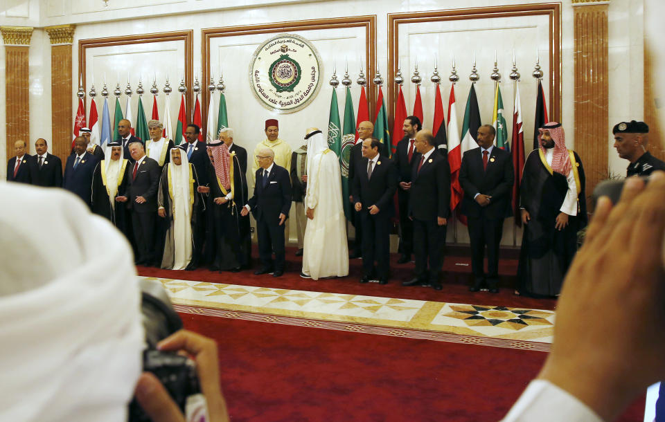 Photographers take a group photo of Arab country leaders before their emergency summit in Mecca, Saudi Arabia, Thursday, May 30, 2019. King Salman opened an emergency summit of Gulf Arab leaders in the holy city of Mecca on Thursday with a call for the international community to use all means to confront Iran, but he also said the kingdom extends its hand for peace. (AP Photo/Amr Nabil)