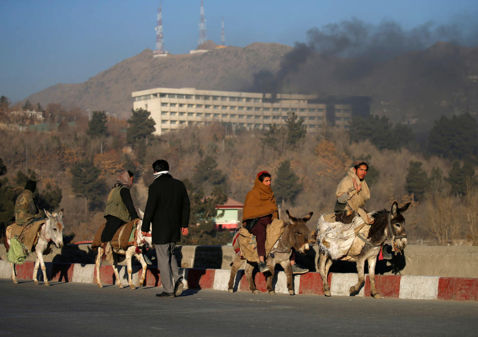 <p>Smoke rises from the Intercontinental Hotel during an attack in Kabul, Afghanistan January 21, 2018. (Photo: Mohammad Ismail/Reuters) </p>