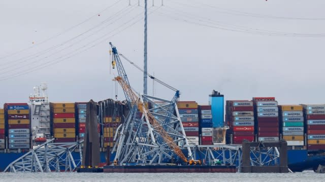 Salvage cranes at the site of a collapsed bridge in Baltimore