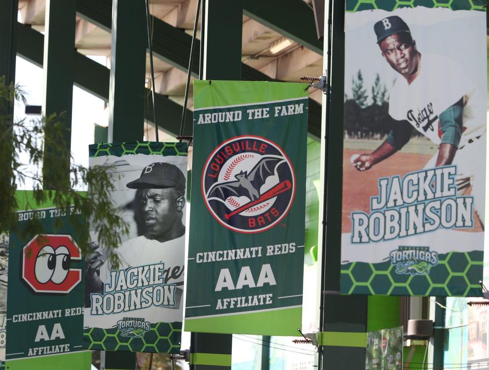 Banners are some of the many tributes to Jackie Robinson at the ballpark named after him, Friday April 12, 2024 in Daytona Beach