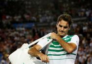 Switzerland's Roger Federer reacts as he leaves after losing his semi-final match against Serbia's Novak Djokovic at the Australian Open tennis tournament at Melbourne Park, Australia, January 28, 2016. REUTERS/Tyrone Siu