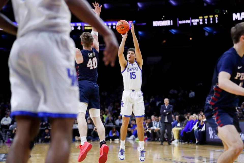 Kentucky’s Reed Sheppard (15) shoots over Pennsylvania’s George Smith (40) during Saturday’s game in Philadelphia. Sheppard finished with six points, five rebounds, three assists, one block and three steals.