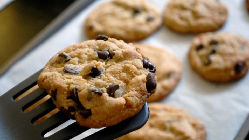 air fryer chocolate chip cookies on spatula after baking